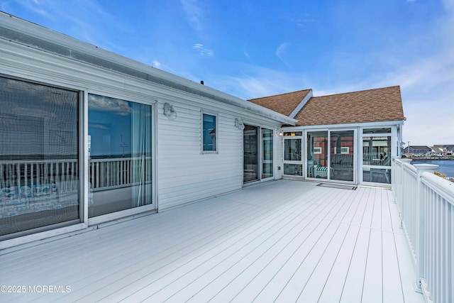 259 Cypress Dr, Bayville, NJ 08721 - wooden deck with a sunroom