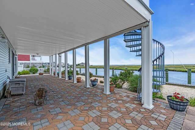 259 Cypress Dr, Bayville, NJ 08721 - view of patio featuring stairs and a water view