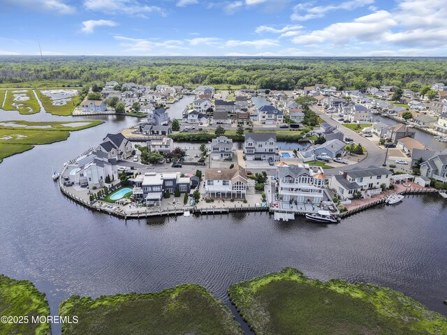 259 Cypress Dr, Bayville, NJ 08721 - aerial perspective of suburban area with a nearby body of water and a heavily wooded area