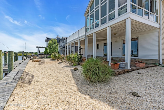 259 Cypress Dr, Bayville, NJ 08721 - view of home's exterior with a sunroom