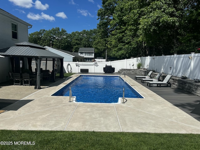 16 Constitution Dr, Howell, NJ 07731 - view of pool featuring a gazebo, a fenced backyard, a patio, and view of scattered trees