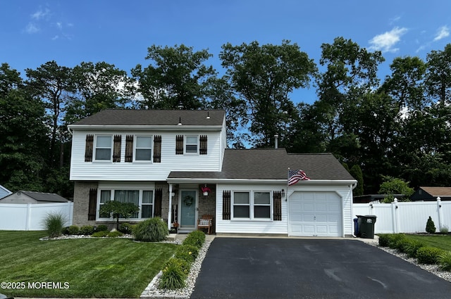 16 Constitution Dr, Howell, NJ 07731 - view of front of property featuring a garage and asphalt driveway