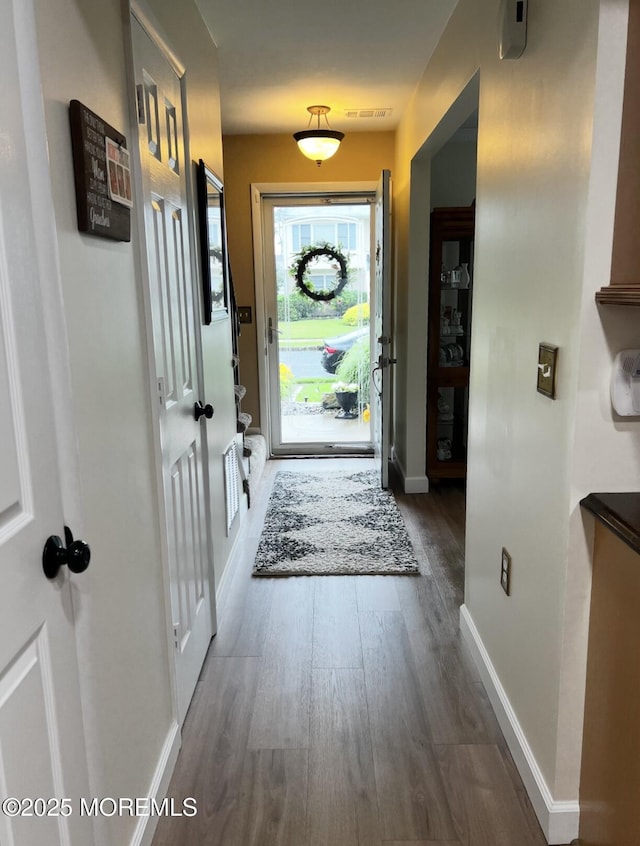 16 Constitution Dr, Howell, NJ 07731 - foyer with wood finished floors and baseboards