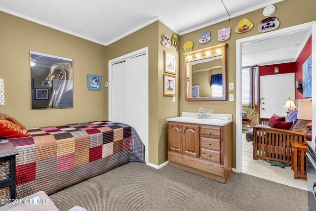 28 Fremont Ave Unit B12, Seaside Heights, NJ 08751 - bedroom with carpet flooring, a closet, and crown molding