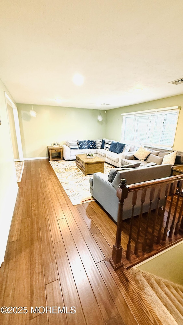 9 Longfellow Ter, Morganville, NJ 07751 - living area with wood-type flooring