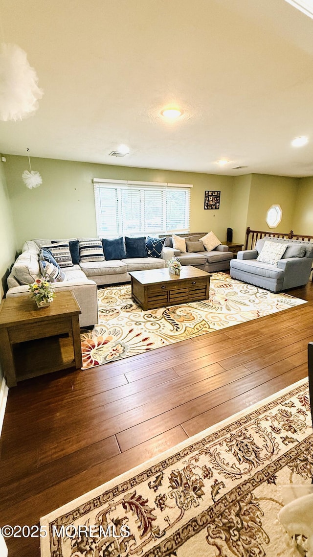 9 Longfellow Ter, Morganville, NJ 07751 - living room featuring wood-type flooring and recessed lighting