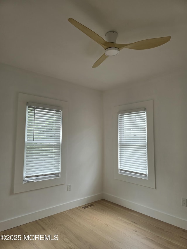 412 Ridge Ave, Neptune Township, NJ 07753 - unfurnished room featuring a ceiling fan and wood finished floors