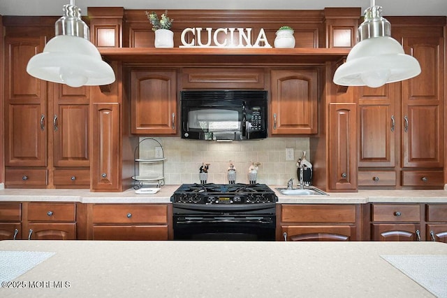 14 Village Rd, Morganville, NJ 07751 - kitchen featuring black appliances, light countertops, brown cabinetry, decorative backsplash, and hanging light fixtures
