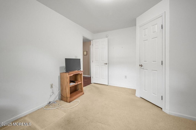 14 Village Rd, Morganville, NJ 07751 - unfurnished bedroom with light carpet and baseboards