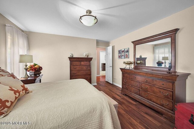 14 Village Rd, Morganville, NJ 07751 - bedroom with dark wood-type flooring and baseboards