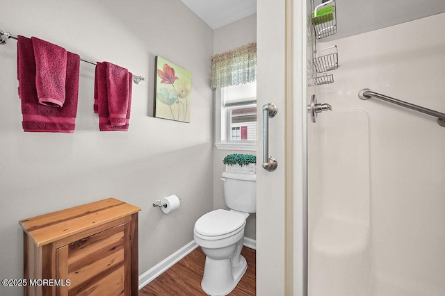 14 Village Rd, Morganville, NJ 07751 - bathroom featuring wood finished floors and a stall shower