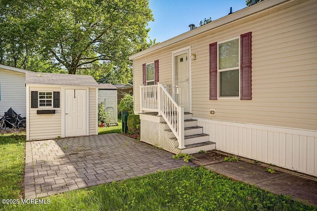 14 Village Rd, Morganville, NJ 07751 - doorway to property with a patio