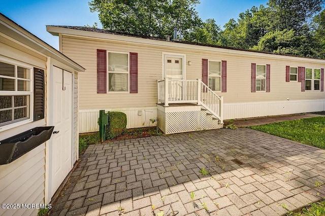 14 Village Rd, Morganville, NJ 07751 - manufactured / mobile home with a patio