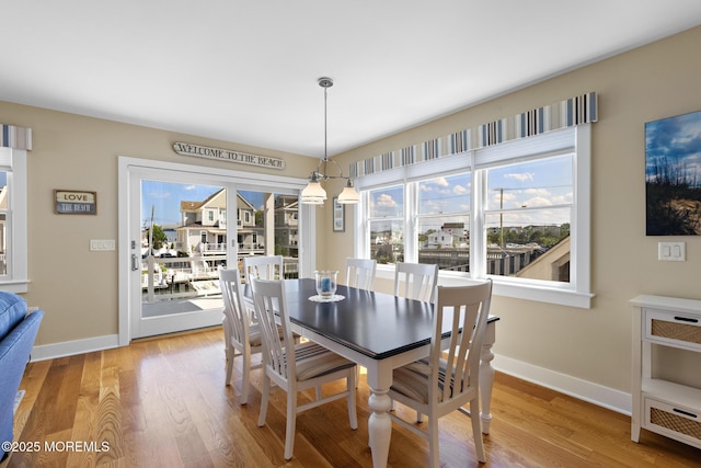 6 Pearce Ct, Manasquan, NJ 08736 - dining space with baseboards and light wood-style flooring