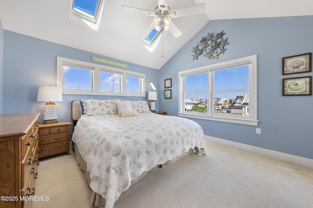 6 Pearce Ct, Manasquan, NJ 08736 - bedroom featuring a skylight, light colored carpet, a ceiling fan, and high vaulted ceiling