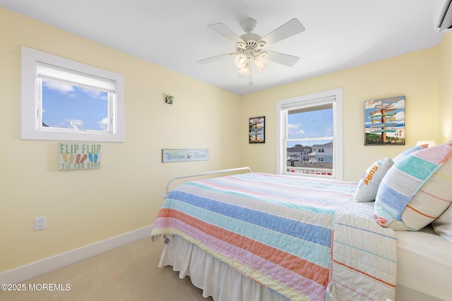 6 Pearce Ct, Manasquan, NJ 08736 - carpeted bedroom with a wall mounted AC and a ceiling fan