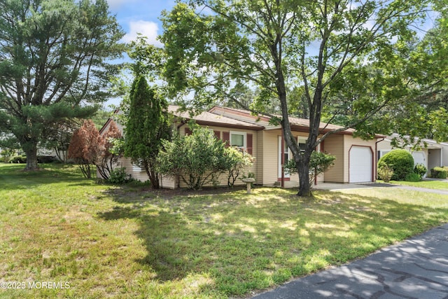41 Falmouth Ave Unit 72, Whiting, NJ 08759 - view of front of house featuring a garage and a front yard