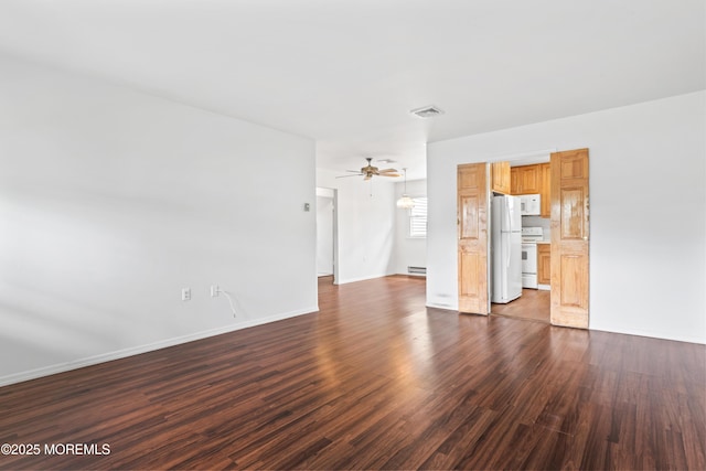41 Falmouth Ave Unit 72, Whiting, NJ 08759 - unfurnished living room with a baseboard heating unit, dark wood-style flooring, and a ceiling fan