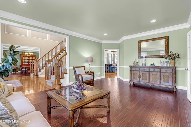 4 Geraldine Ct, Farmingdale, NJ 07727 - living room with a chandelier, stairway, dark wood-style flooring, recessed lighting, and ornamental molding