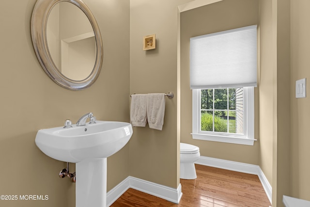 4 Geraldine Ct, Farmingdale, NJ 07727 - bathroom with baseboards and wood finished floors