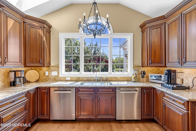 4 Geraldine Ct, Farmingdale, NJ 07727 - kitchen with stainless steel dishwasher, a chandelier, plenty of natural light, and vaulted ceiling