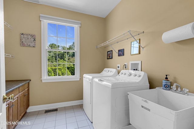 4 Geraldine Ct, Farmingdale, NJ 07727 - laundry room featuring washer and dryer, cabinet space, plenty of natural light, and light tile patterned floors