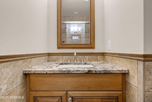 4 Geraldine Ct, Farmingdale, NJ 07727 - bathroom with tile walls, vanity, and wainscoting