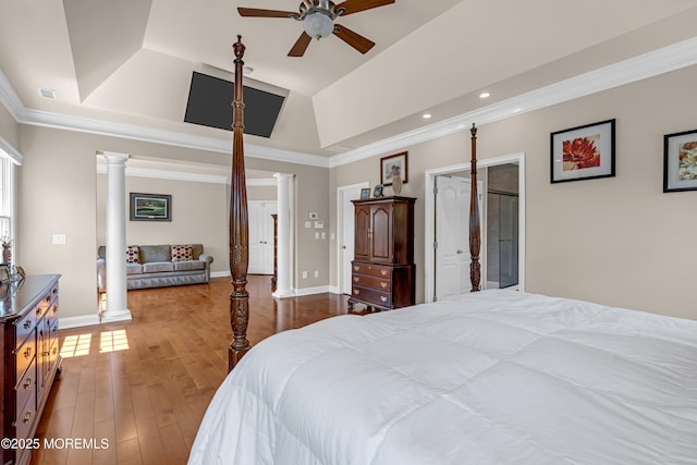4 Geraldine Ct, Farmingdale, NJ 07727 - bedroom featuring ornate columns, wood finished floors, recessed lighting, ornamental molding, and a tray ceiling