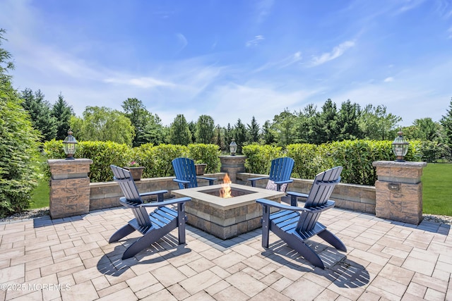 4 Geraldine Ct, Farmingdale, NJ 07727 - view of patio / terrace featuring a fire pit