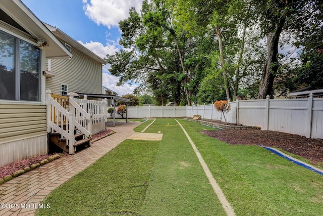 8 Shadow Ridge Ct, Howell, NJ 07731 - fenced backyard featuring a wooden deck