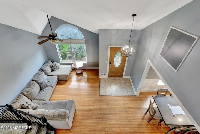 8 Shadow Ridge Ct, Howell, NJ 07731 - living area featuring light wood-style floors, a chandelier, ceiling fan, and lofted ceiling