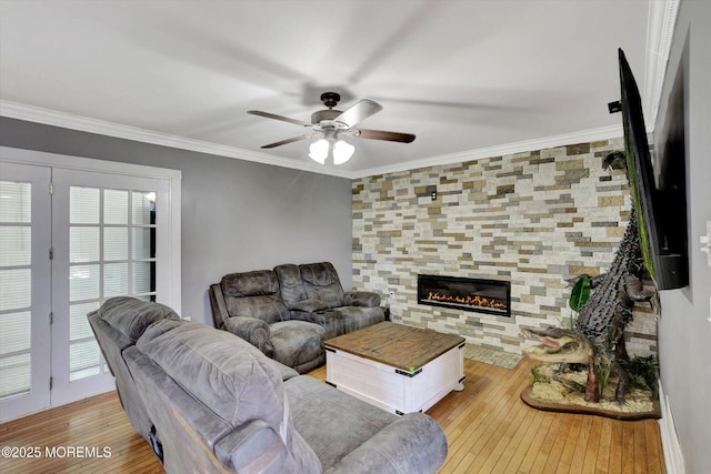 8 Shadow Ridge Ct, Howell, NJ 07731 - living area featuring wood-type flooring, a ceiling fan, a tiled fireplace, and crown molding