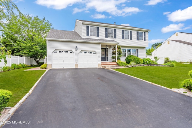 51 Davids Ln, Howell, NJ 07731 - view of front of home with asphalt driveway and a garage