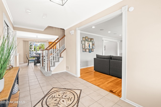 51 Davids Ln, Howell, NJ 07731 - entryway with light tile patterned floors, crown molding, stairway, and recessed lighting
