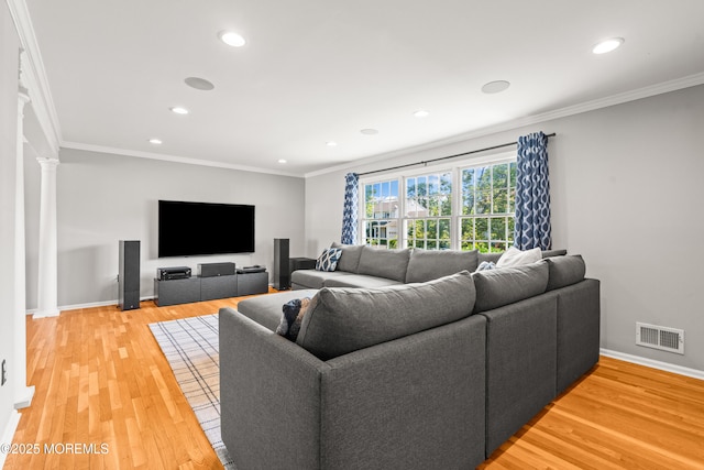 51 Davids Ln, Howell, NJ 07731 - living area featuring light wood-type flooring, ornamental molding, recessed lighting, and decorative columns