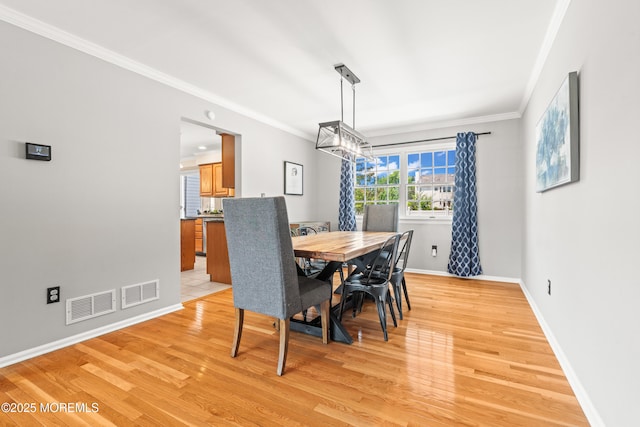 51 Davids Ln, Howell, NJ 07731 - dining room with ornamental molding and light wood-type flooring
