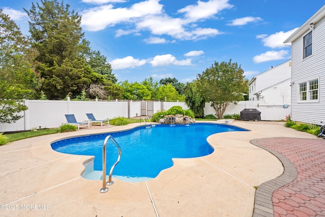 51 Davids Ln, Howell, NJ 07731 - view of pool featuring a patio area, a fenced backyard, a diving board, and area for grilling