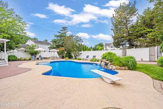 51 Davids Ln, Howell, NJ 07731 - view of swimming pool with a patio, a diving board, and a fenced backyard