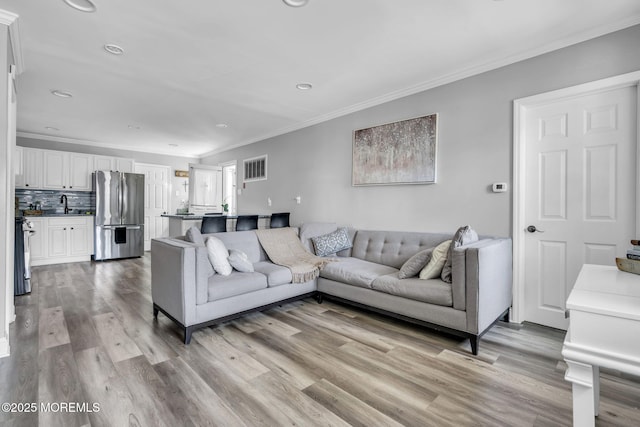 37 Kennedy Way, Keansburg, NJ 07734 - living room featuring ornamental molding, light wood-type flooring, and recessed lighting