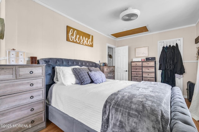 37 Kennedy Way, Keansburg, NJ 07734 - bedroom with attic access, crown molding, and wood finished floors