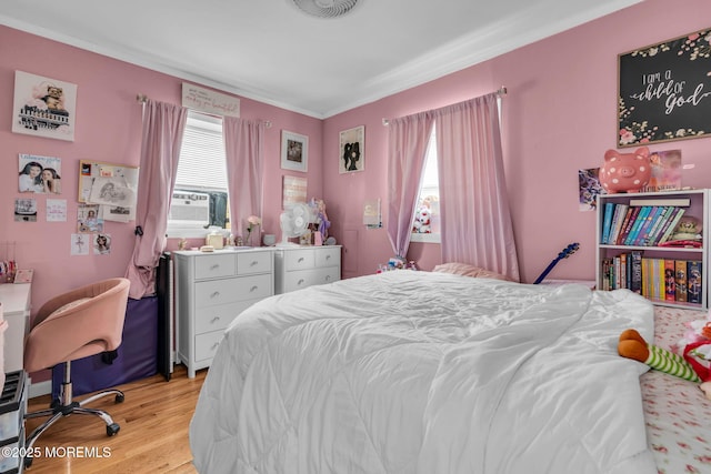 37 Kennedy Way, Keansburg, NJ 07734 - bedroom featuring multiple windows, light wood-style flooring, cooling unit, and ornamental molding