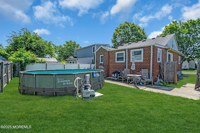 37 Kennedy Way, Keansburg, NJ 07734 - back of property featuring brick siding and a fenced backyard