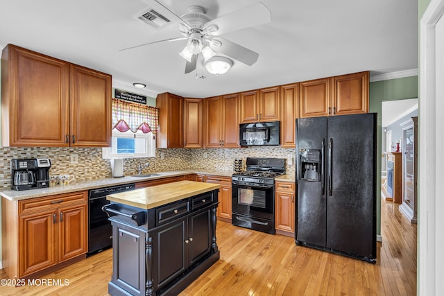 3 Redlands Ct, Toms River, NJ 08757 - kitchen featuring black appliances, wood counters, crown molding, ceiling fan, and light wood finished floors