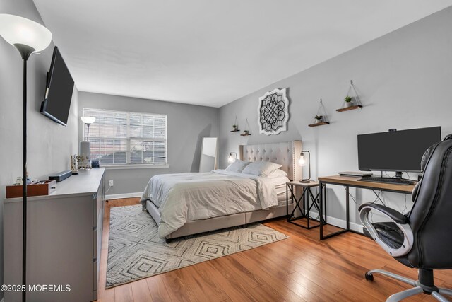 193 Sierra Ct, Woodbridge, NJ 07095 - bedroom with wood finished floors and a desk