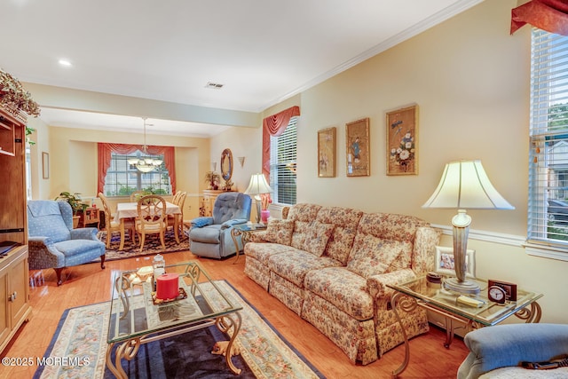41 Sunrise Bay Blvd, Little Egg Harbor, NJ 08087 - living room with light wood-type flooring, plenty of natural light, and crown molding