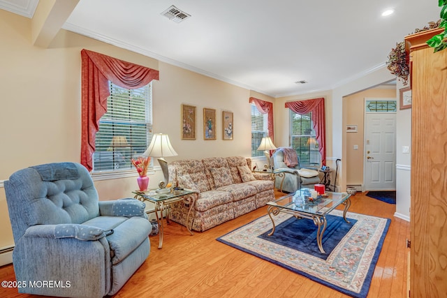 41 Sunrise Bay Blvd, Little Egg Harbor, NJ 08087 - living room featuring wood finished floors, plenty of natural light, ornamental molding, recessed lighting, and a baseboard heating unit