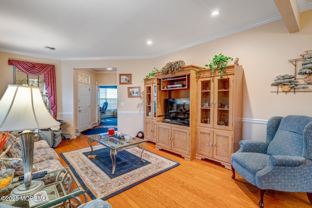 41 Sunrise Bay Blvd, Little Egg Harbor, NJ 08087 - living room with light wood finished floors, ornamental molding, recessed lighting, and a baseboard heating unit