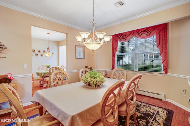 41 Sunrise Bay Blvd, Little Egg Harbor, NJ 08087 - dining room featuring a baseboard heating unit, a chandelier, hardwood / wood-style floors, and ornamental molding