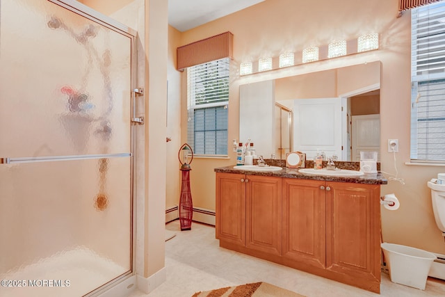41 Sunrise Bay Blvd, Little Egg Harbor, NJ 08087 - full bath with a stall shower, a baseboard heating unit, and double vanity