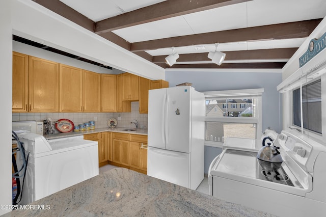 8 Ralph Ln, Beach Haven West, NJ 08050 - kitchen featuring white appliances, tasteful backsplash, separate washer and dryer, and light stone countertops
